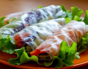 Vibrant Trio of Dewy Vietnamese Summer Rolls on Crisp Lettuce