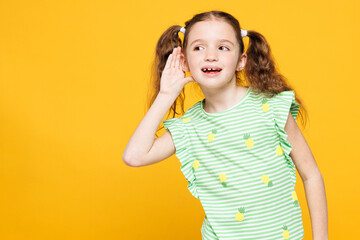 Little curious nosy fun cute kid child girl 8-9 years old wear green t-shirt try to hear you...