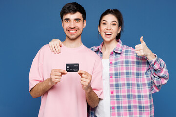 Young happy couple two friends family man woman they wear pink casual clothes together hold in hand...