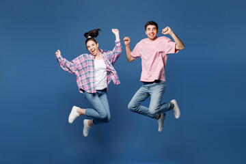 Full body young smiling happy couple two friends family man woman they wear pink casual clothes...