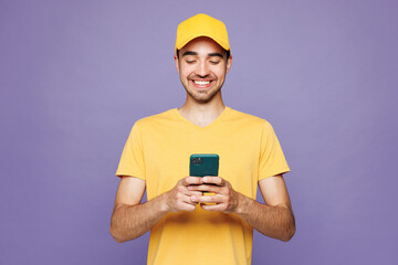 Professional delivery guy employee man wear yellow cap t-shirt uniform workwear work as dealer...