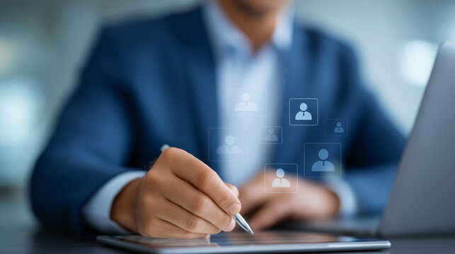 Businessperson in Suit Selecting Candidate Profiles on Tablet