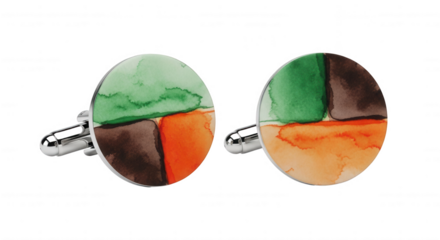 Pair of round cufflinks featuring abstract watercolor design in green brown and orange isolated on transparent background