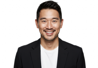 A confident asian man in a black suit and white shirt smiles at the camera isolated on transparent background