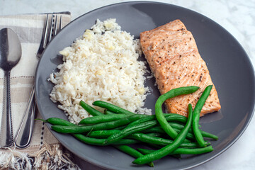 seasoned salmon with  rice and green beans