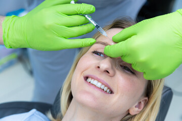 A Professional Aesthetic Procedure: Close-Up of a Smiling Woman Receiving Botox Injection in a Modern Clinic with Green Gloves and Comfortable Atmosphere