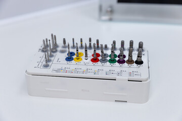 Diverse Selection of Dental Drill Bits Arrayed Neatly for Easy Access and Identification in a...