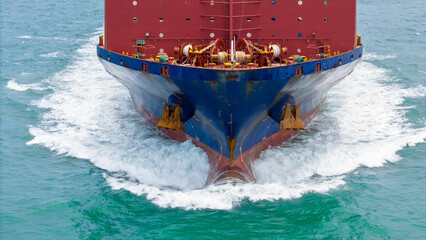 Nose Cargo container Ship, cargo vessel ship carrying container and running for import export concept technology freight shipping sea freight by Express Ship. front view