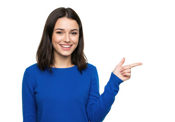 A happy young woman with short dark hair smiles and points to the right, wearing a blue sweater, isolated on a transparent background