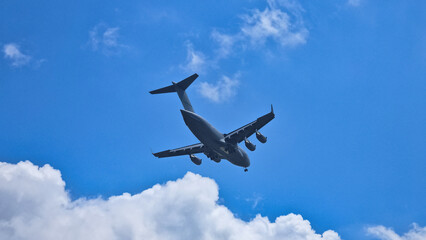A plane flying in the sky.