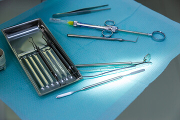 A Comprehensive Overview of Various Dental Instruments Carefully Arranged for Medical Use on a...