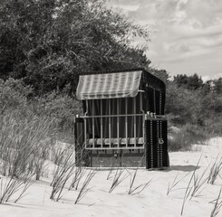 Relaxing in a beach chair by the dunes