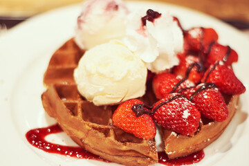 Strawberry Waffle with Ice Cream and Chocolate Syrup