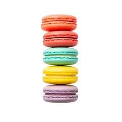 Colorful macarons stacked on black background