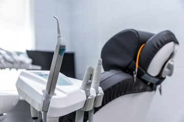 Modern Dental Equipment in a Bright Clinic Setting Featuring Advanced Tools for Oral Care and...