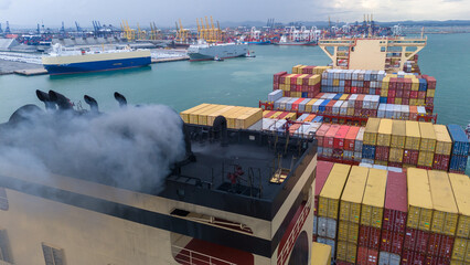 Smoke exhaust gas emissions carbon dioxide from cargo lagre ship container ship,Marine diesel...