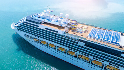 Aerial view of beautiful white cruise ship above luxury cruise in the ocean sea at early in the...
