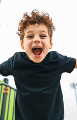 Happy kid on playground on summer season
