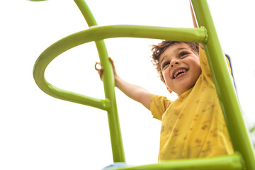 Happy kid on playground on summer season