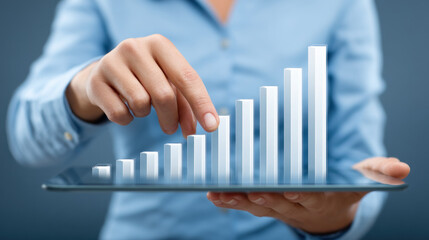 Businesswoman hand touching digital bar chart growth on tablet, representing financial success, data analysis, and technology innovation
