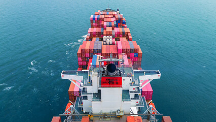  Stern Cargo Container ship the ocean ship carrying container and running for import export concept...