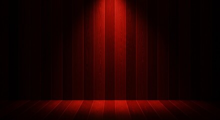 A spotlight illuminates a stage or backdrop with vertical red stripes and a matching red floor, creating a dramatic and theatrical atmosphere.