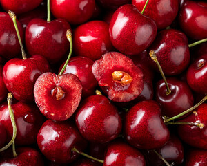 Fresh, juicy red cherries on a white background, some on a plate, symbolize a delicious and healthy summer fruit