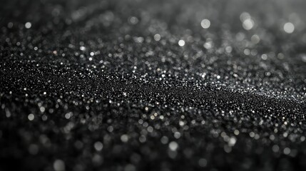 Fine grit sandpaper close-up texture with dust particles, industrial abrasive material detail in neutral gray tones