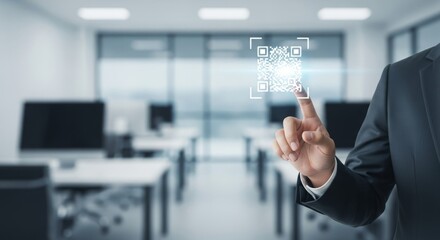 Business professional scanning a QR code in a modern office setting with computers in the background