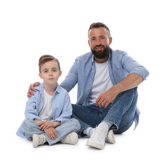 Family. Smiling dad and his son on white background