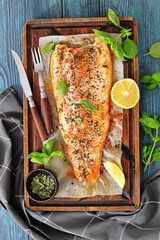 Fototapeta na wymiar grilled salmon fillets with skin-on, top view