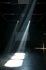 Dramatic stage lighting creating spotlight effect in dark theater ambiance illumination