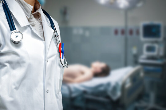 Close-up of doctor in white medical coat with stethoscope, cropped professional figure representing medicine, health care, regular check-ups, prevention and medical diagnostics concept. - Powered by Adobe