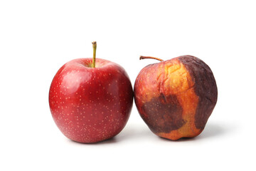 Rotten apple and fresh one isolated on white