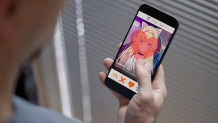 Person like an anime girl on waifu dating app smartphone over shoulder view