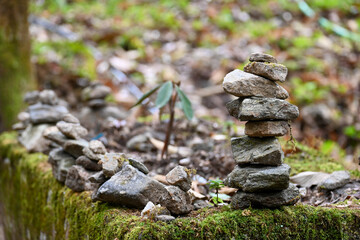 Stone cairns in forest Lucky