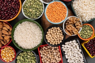 several pots with raw grains for preparing healthy food