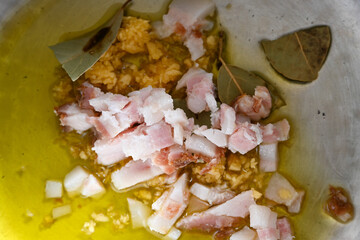 Pan with seasoning to prepare beans
