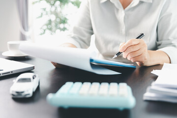 Sale agent deal to agreement successful car loan contract with customer and sign agreement contract...