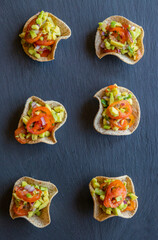 guacamole bites served as a fresh party appetizer. perfect for summer events, healthy snacking, or finger food ideas. ideal for food bloggers, catering menus, and recipe content