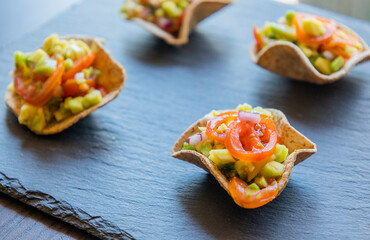 guacamole bites served as a fresh party appetizer. perfect for summer events, healthy snacking, or finger food ideas. ideal for food bloggers, catering menus, and recipe content
