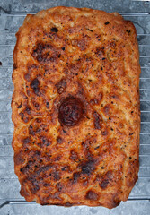Focaccia with olive oil in full frame as background texture