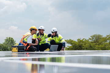 Multiracial team of engineers working on solar panel alignment outdoors, showing unity, innovation,...