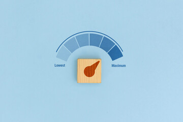 Performance Meter Maximum Indicator Wooden Block on Blue Background