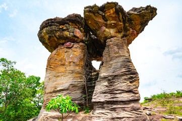 Big stone Pillar , scenic view of giant mushroom-shaped rock formation known as Sao Chaliang at Ban Pha Chan, Ubon Ratchathani, Thailand