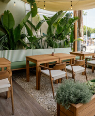 Cozy Café Atmosphere with Natural Light and Relaxed Ambience


