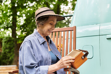 Joyful moments of a senior woman exploring her garden on a sunny afternoon