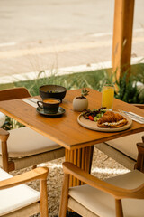Cozy Outdoor Café Table with Turkish Tea and Colorful Brunch

