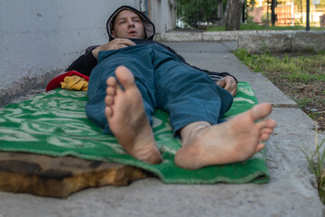 Homeless marginalized person living on the street