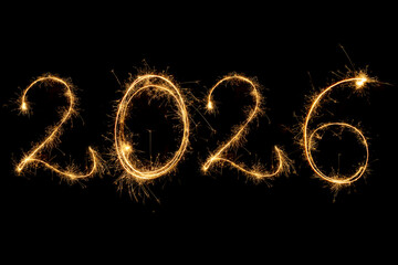 Happy New Year 2026. Number 2026 written sparkling sparklers isolated on black background with copy space for text. Glowing, creative overlay template for holiday greeting card or banner design
